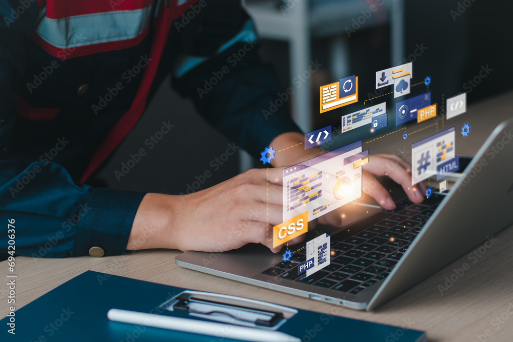 Fototapeta premium Computer programming, developing software with computer engineering. Professional programmer working writing code for website with multiple program. technology and computer engineering concept.
