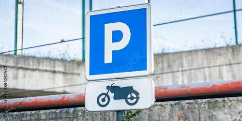 Sign designating a motorcycle parking lot in Paris, France