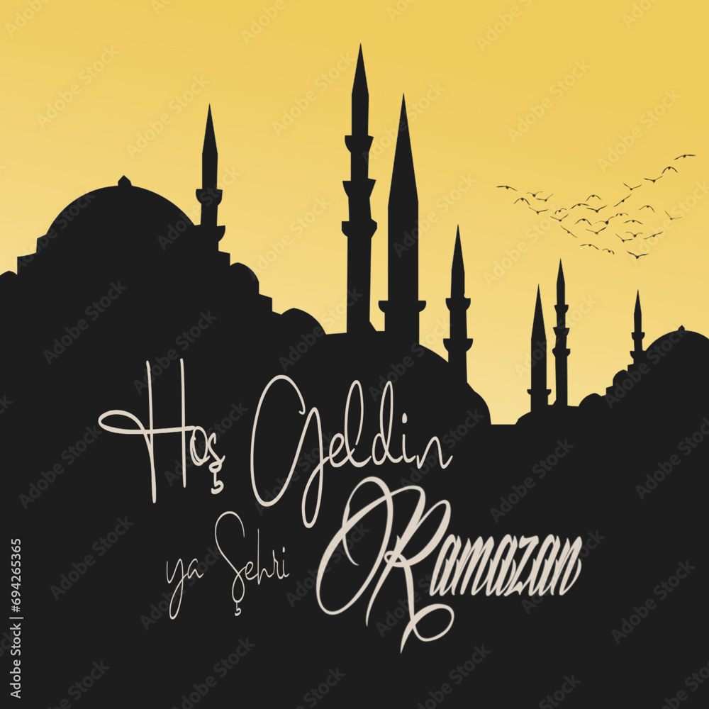 Hos Geldin Ya Sehri Ramazan or Ramadan Kareem. Silhouette of Istanbul mosque and birds at sunset.. Welcome to the holy month of Ramadan text.