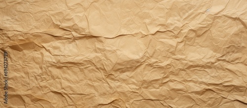 Brown paper texture crumpled horizontally.