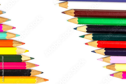 Lots of colored pencils for drawing on a white background photo