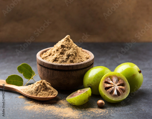 amla powder with raw avla, it's an ayurvedic alternative medicine photo
