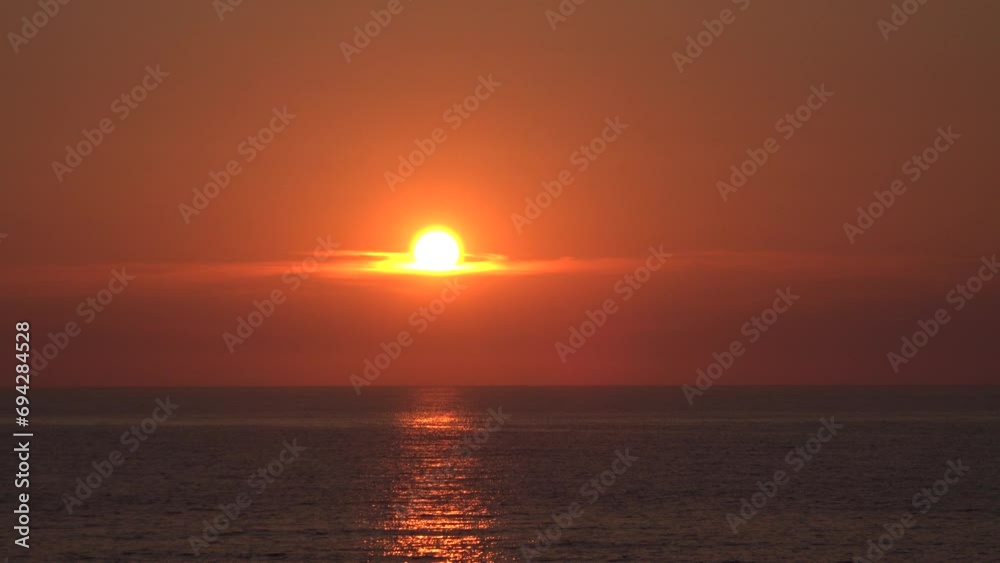 Sunset on Sky, Sea Beach, Dramatic Sunrise on Seashore, Ocean at Sundown, Traveling in Summer Vacation View Sunset on Sky, Sea Beach, Dramatic Sunrise on Seashore, Ocean at Sundown, Traveling in Summer Vacation View