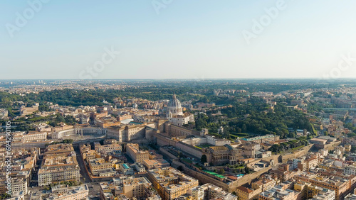 Rome, Italy. View of the Vatican. Basilica di San Pietro, Piazza San Pietro. Flight over the city. Evening time, Aerial View