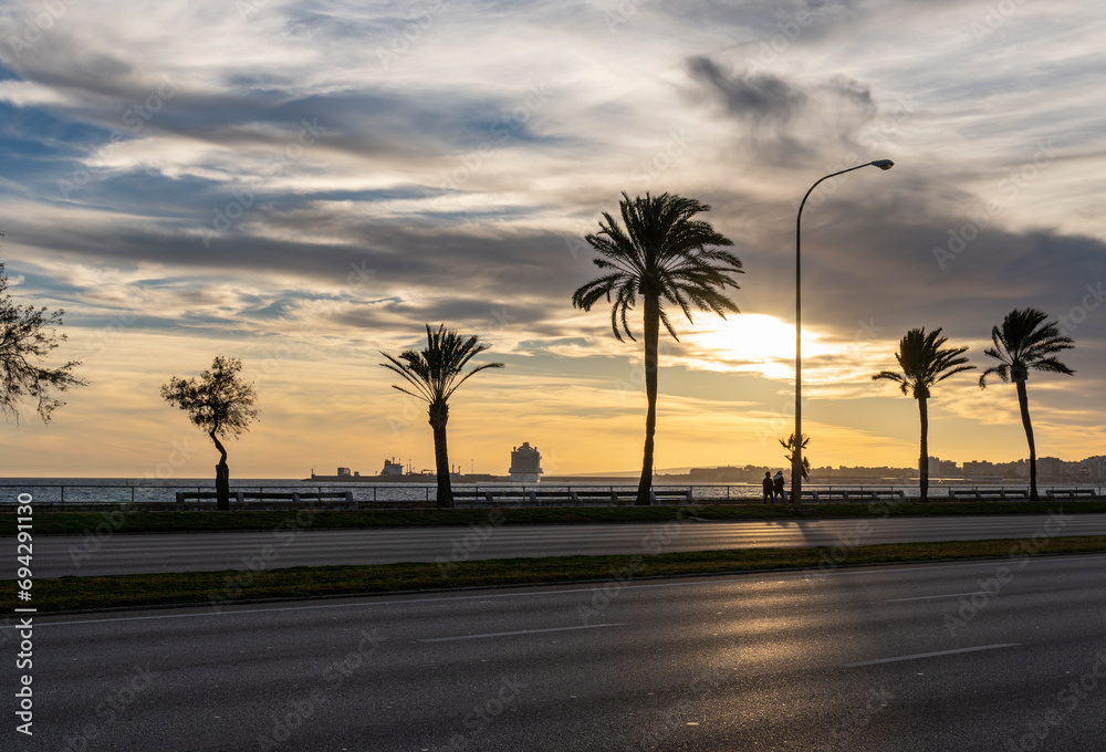 Sunset on the promenade of Palma de Mallorca Sunset on the promenade of Palma de Mallorca