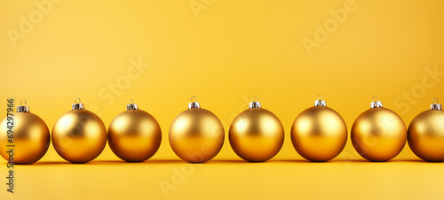 yellow Christmas tree decorations on a yellow background stand in a row, generative ai