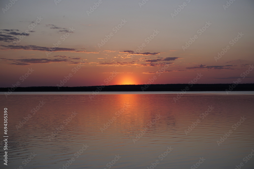 A beautiful sunset in the Berezinsky Reserve on the shore of Lake Plavno. Spring. April.	