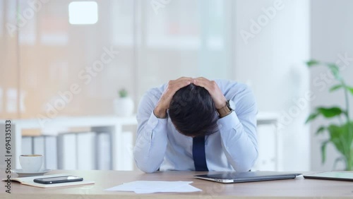 Stressed Sales manager is angry about a bad sales report after a marketing campaign. Frustrated executive is upset and annoyed about advertising problem while under pressure to meet his deadline photo