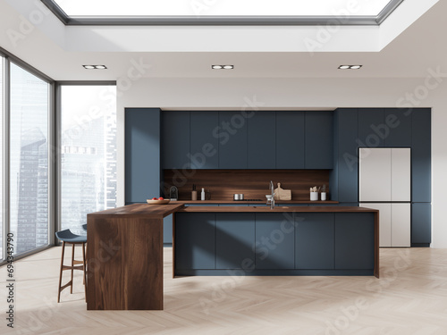 Modern home kitchen interior with bar island and cooking cabinet with window