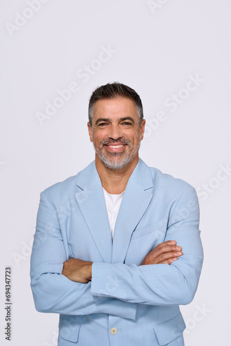 Happy middle aged business man ceo entrepreneur, smiling older professional executive manager, confident businessman looking at camera standing with arms crossed isolated on white, vertical portrait.