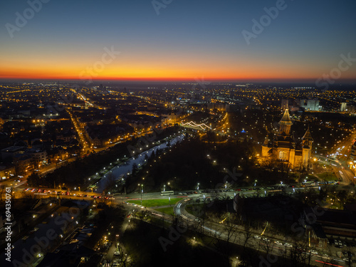 Aerial view of Timisoara, Romania with the city lights and Christmas lights at blue hour © Kozma