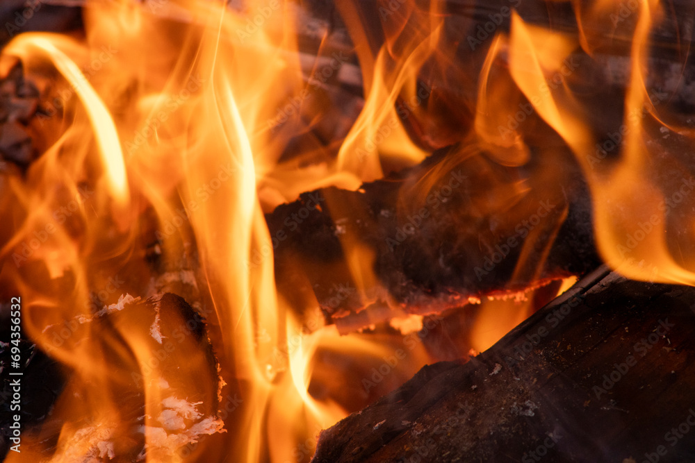 Fototapeta premium Fire flames on a black background beautifully dancing.