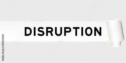 Ripped gray paper background that have word disruption under torn part
