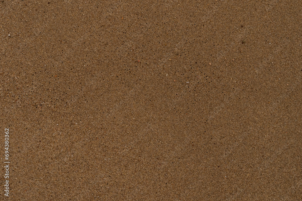 Texture of wet sand on a beach top view - obrazy, fototapety, plakaty 