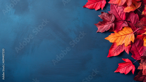 autumn leaves on a blue background.