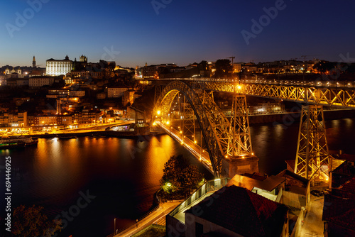 View at night of Don Luis I bridge, which connect Porto and Vilanova de Gaia in Portugal. 