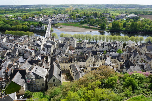 panoramic view of country picturesque village of chinon with the stone bridge across the vienne river from the castle, france photo