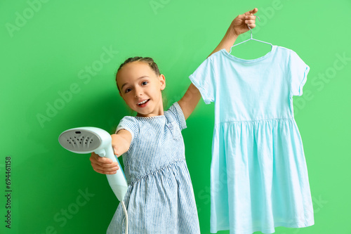 Happy little girl holding a...