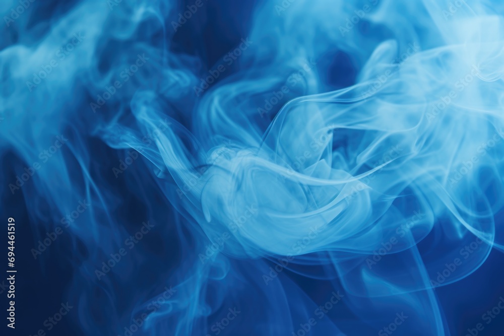 Close up of blue smoke on a black background. Versatile image for various design projects Close up of blue smoke on a black background. Versatile image for various design projects