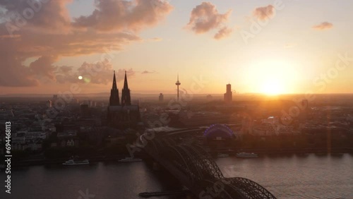 Aerial view of Cologne City skyline and Rhine river at sunset photo