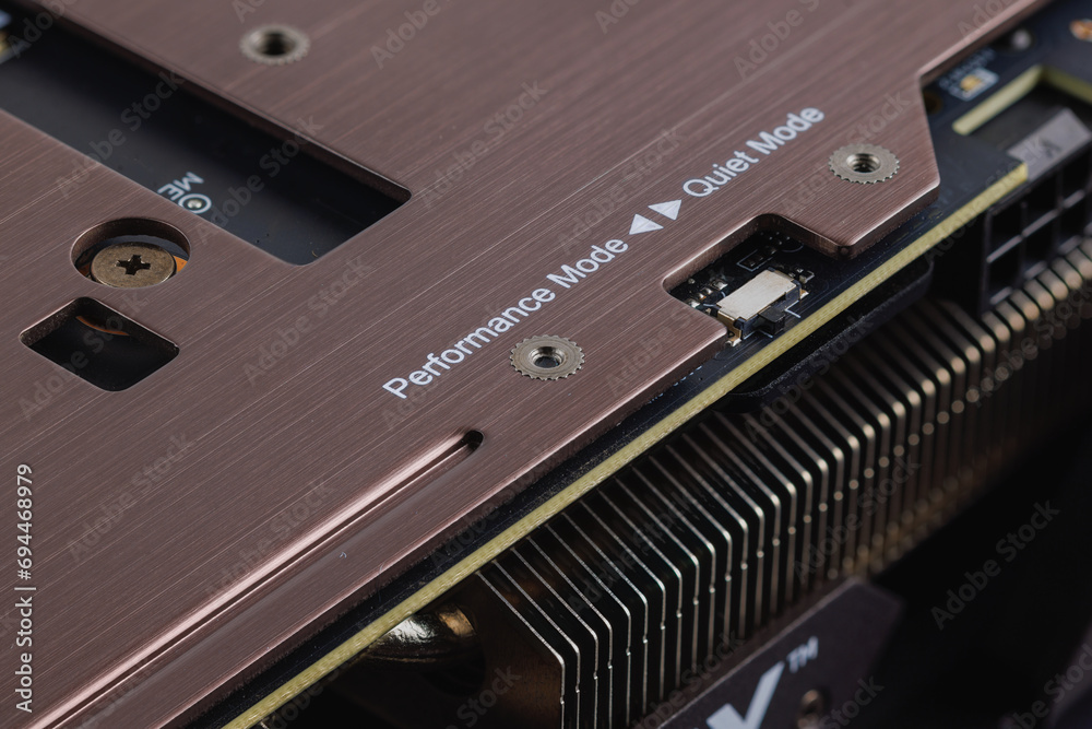 Obraz premium switch between performance mode and quiet mode on modern graphics card, closeup