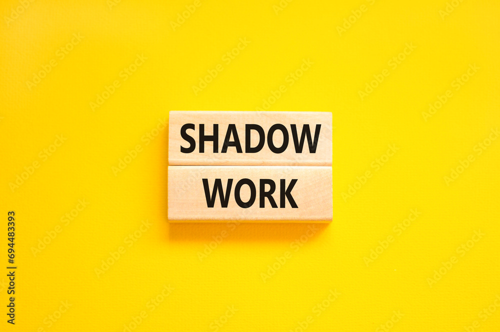 Naklejka premium Shadow work psychology symbol. Concept words Shadow work on beautiful wooden blocks. Beautiful yellow table yellow background. Psychology shadow work concept. Copy space.