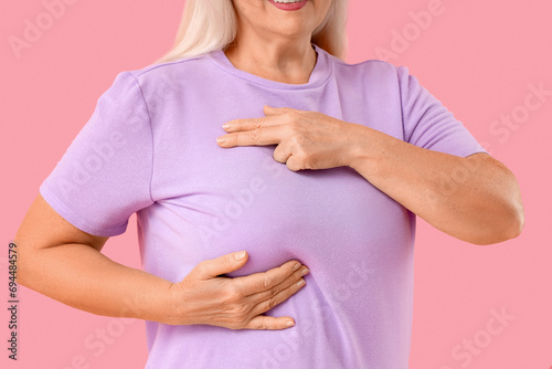 Mature woman checking her b...
