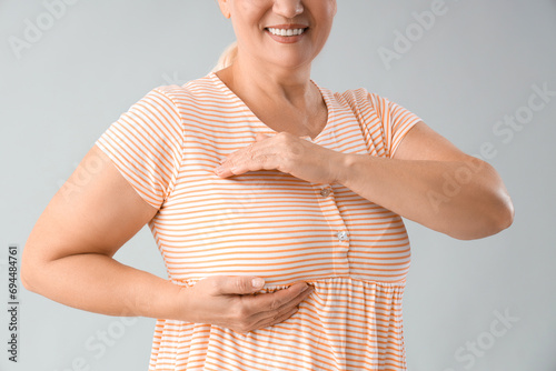 Mature woman checking her b...