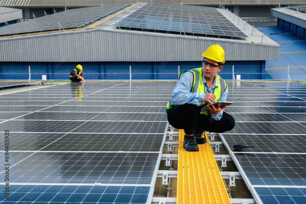 custom made wallpaper toronto digitalEngineers or Specialist technicians check the quality of installing solar photovoltaic panels and Use technology applications to check accumulated power generation from solar panels on tablets.