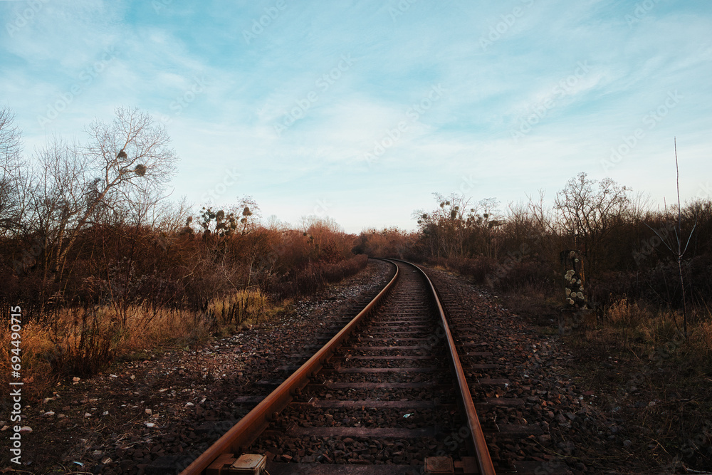 Railroad tracks in the Countryside - Rails - Rail Track - Background - Railroad - Concept - Horizon - Nature - Sky - Urbex / Urbexing - Lost Place 