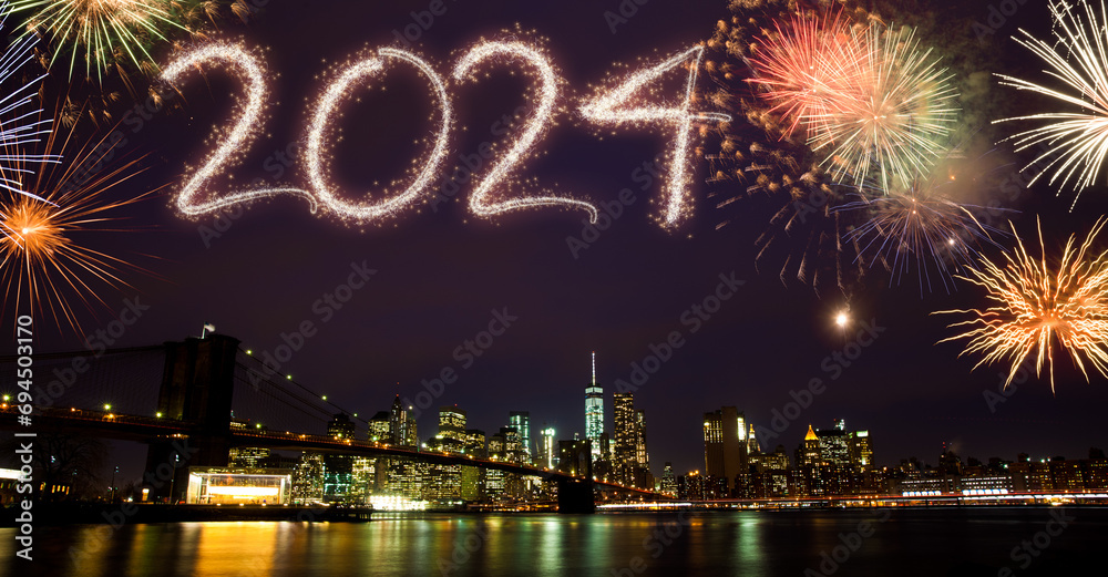 Happy new year 2024 fireworks display over city skyline