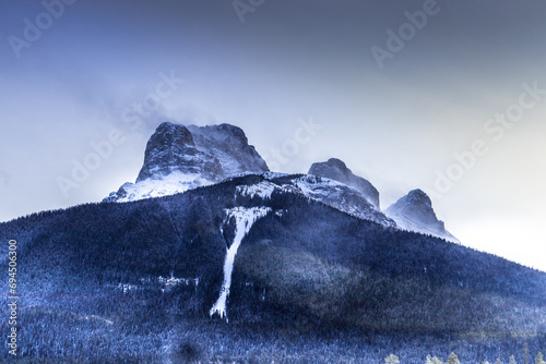Three sisters from the Three sisters parkway. Canmore, Alberta, Canada photo