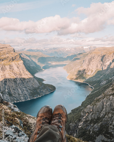 Wallpaper Mural Norwegian mountain scene featuring visible shoes, evoking adventure and wanderlust Torontodigital.ca