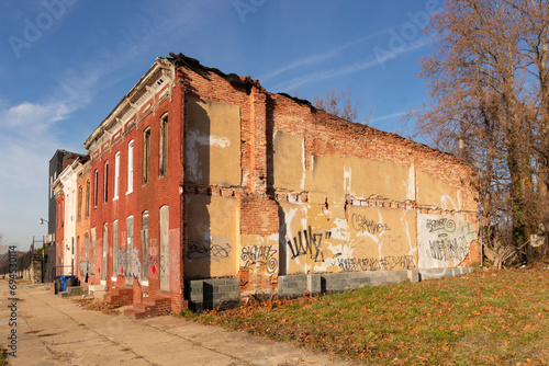 Vacant Row houses with do not enter symbols in East Baltimore