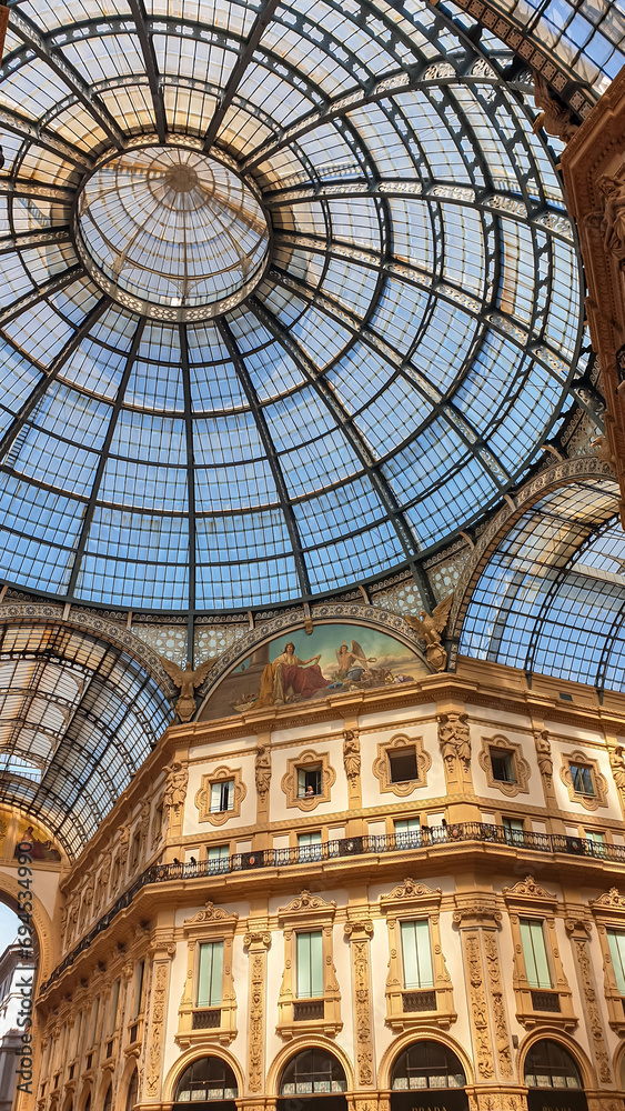 Beautiful ceiling of the shopping mall Galleria Vittorio Emanuele II, an historic shopping mall in the city centre of Milan, Lombardy, Italy, Europe. Famous and luxury brands are represented there
