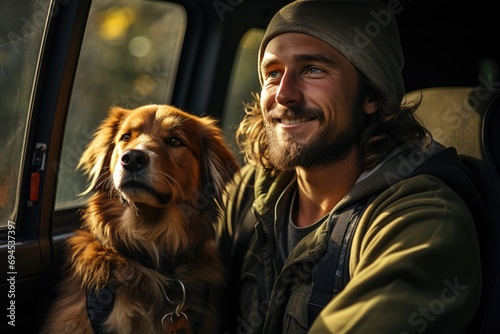 Man and a dog in a car © LifeMedia