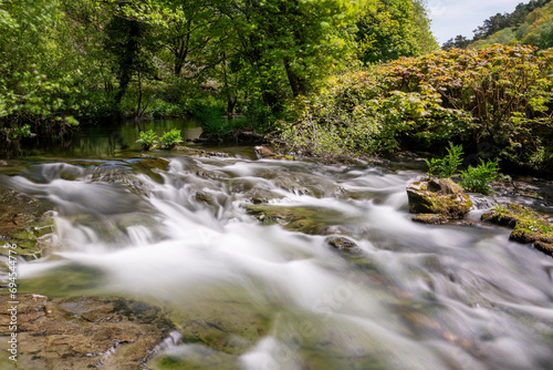 Long exposure of a waterfall on the East Lyn River in The Doone Valley in Exmoor National Park photo