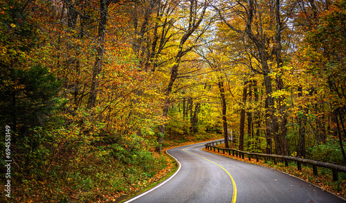 Winding road in New England Autumn