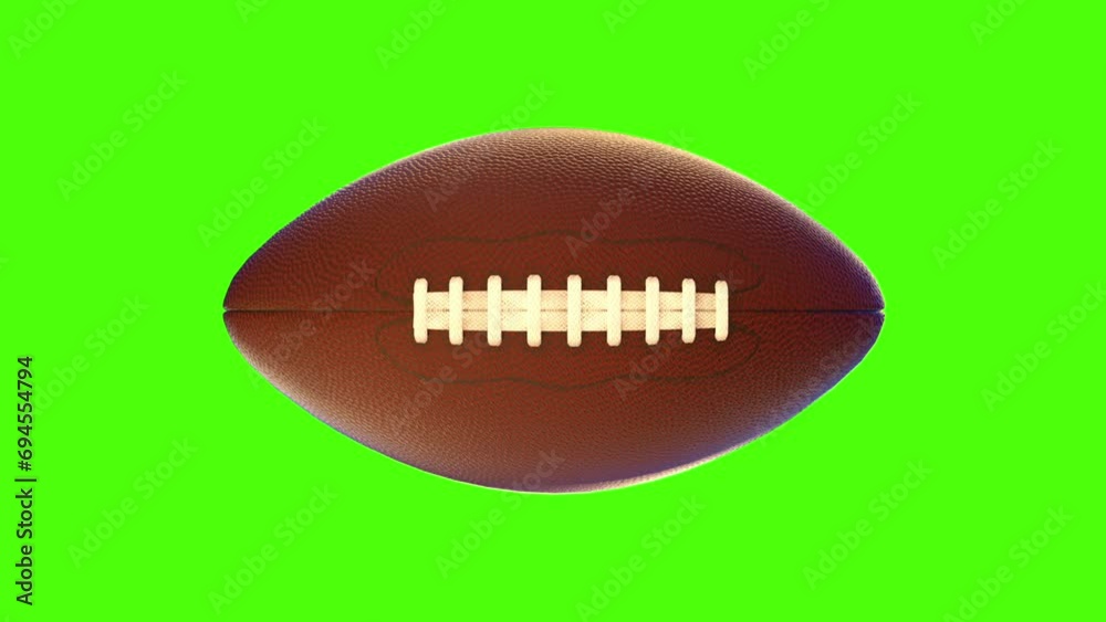 Spinning American football ball. Green screen Spinning American football ball. Green screen
