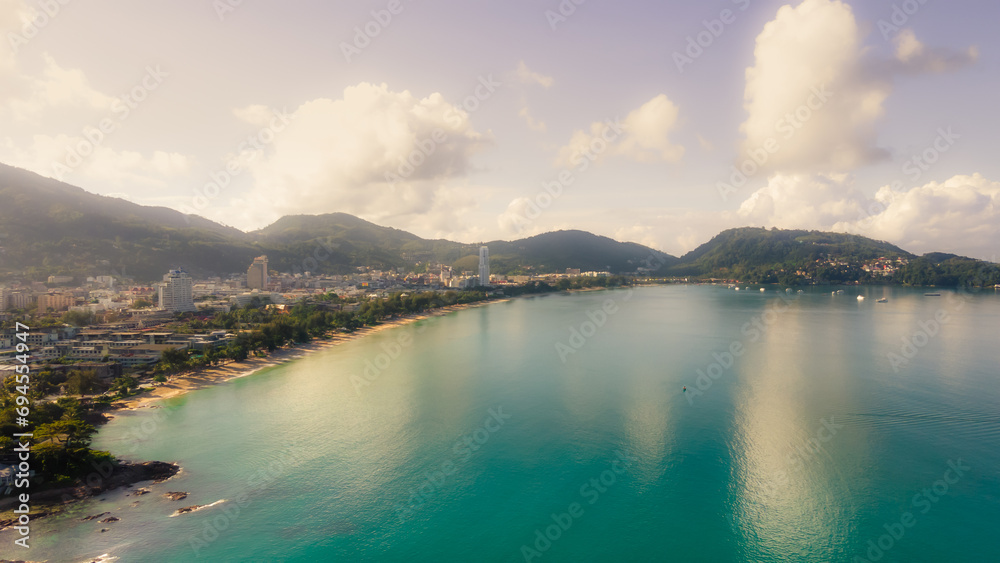 Patong Beach Popular places. afternoon light sky and blue ocean are on the back of white Phuket sea is the one of landmarks on Phuket island Thailand. Patong Beach Popular places. afternoon light sky and blue ocean are on the back of white Phuket sea is the one of landmarks on Phuket island Thailand.