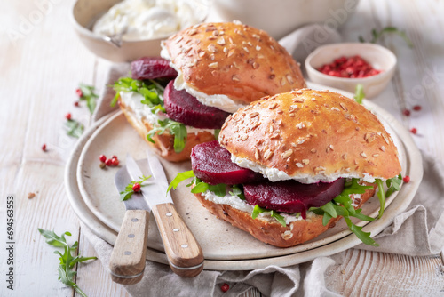 Delicious and fresh sandwich with creamy cheese and beetroot.
