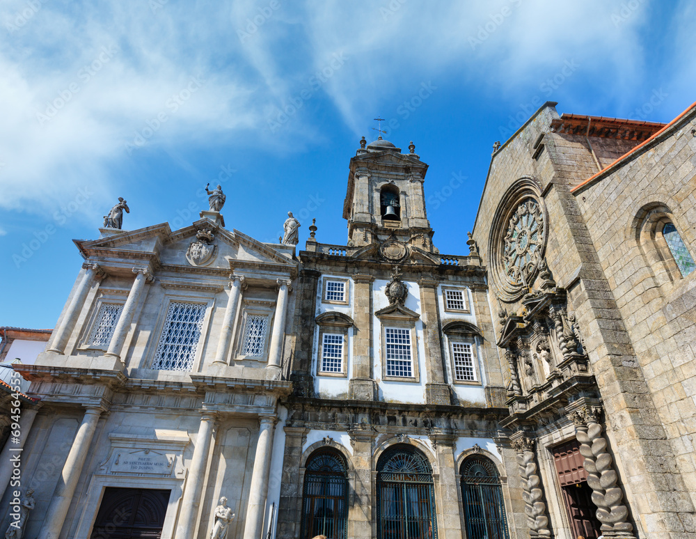 Baroque main portal and Gothic rose window of main facade St. Francis Church, Porto, Portugal.