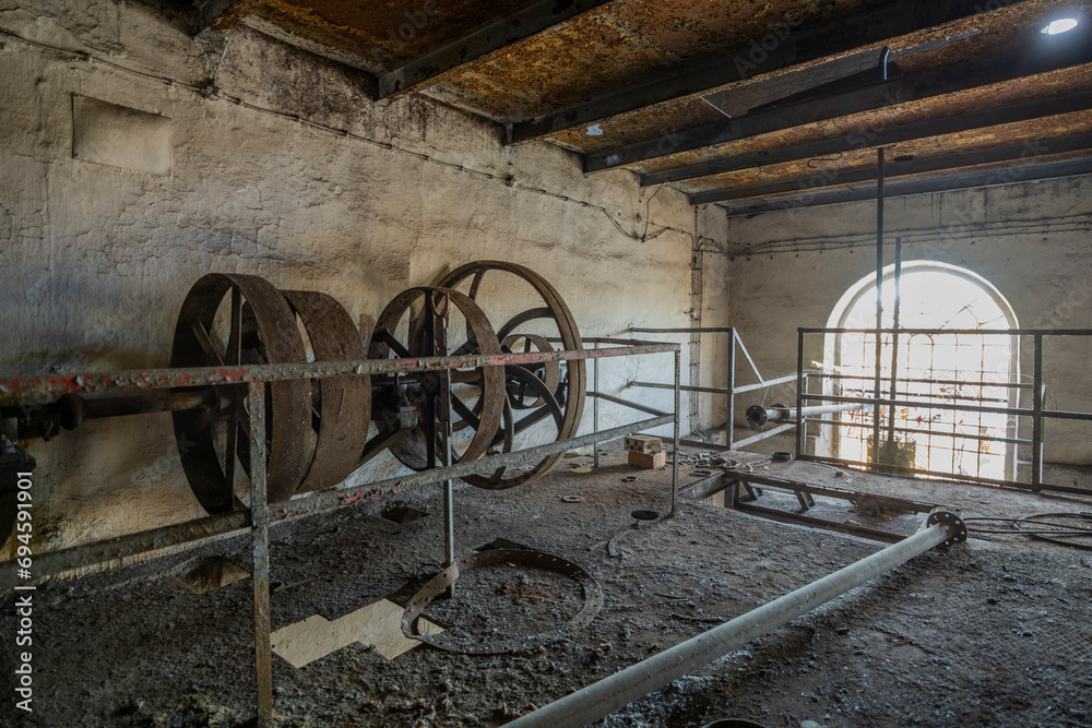 Obraz premium The Enchanting Old Brick Distillery Adjacent to an Abandoned Manor – For Sale