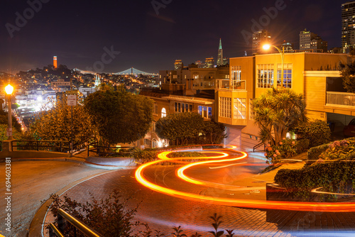 View of the beautiful Lombard Street during night time in San Francisco photo