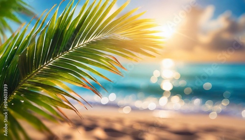 Blur beach with palm leaf abstract background. Summmer vacation concept. 