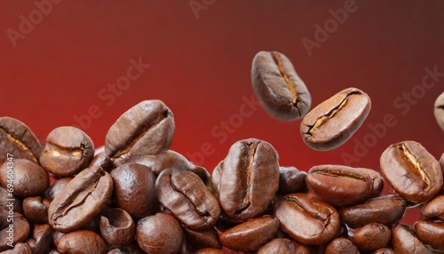 Coffee beans. Macro coffee beans levitating, banner with copy space for text, red background © adobedesigner