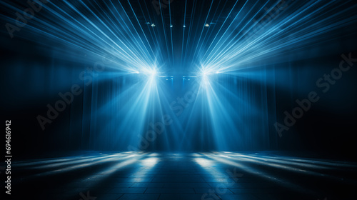 Blue stage curtain with spotlights. scene, stage light with colored spotlights and smoke. Stage on the dark floor with lights on the perimeter. theater stage Art concept..