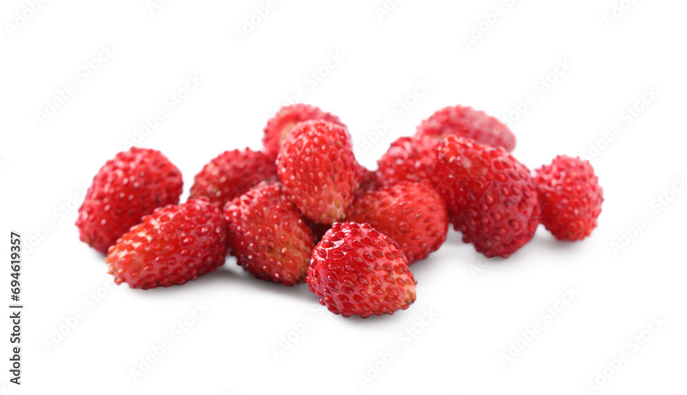 Ripe red wild strawberries isolated on white Ripe red wild strawberries isolated on white