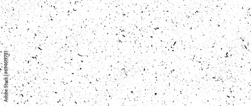 Black and white mottled seamless pattern. Small grunge sprinkles, particles, dots and spots texture. Noise grain repeating background. Overlay random grit wallpaper. Vector dust backdrop