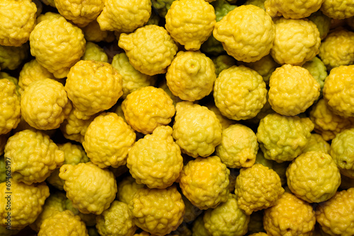 The texture of a ripe yellow kaffir lime photo
